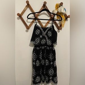 Romeo and Juliet Couture off the shoulder black and white dress size medium.